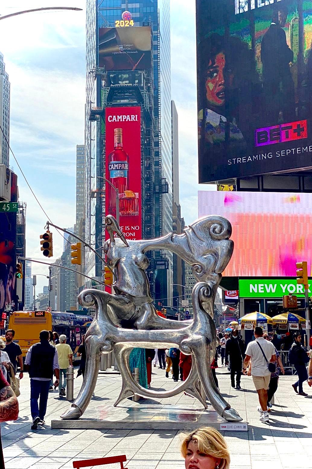 La chaise adulte en Times Square